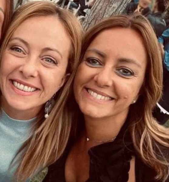 Giorgia Meloni (L) posted a photo of herself with Nicoletta Golisano
