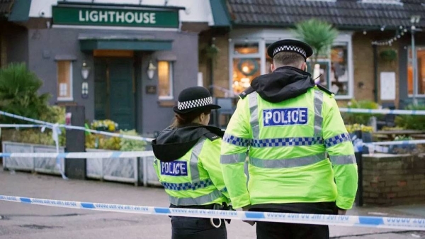 British police officers remained at the scene on Sunday morning. — courtesy PA Media