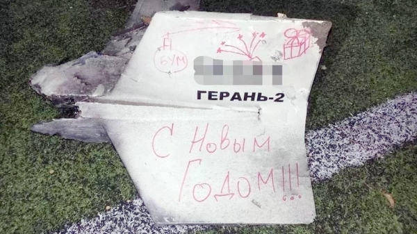 A downed drone found in a children's playground in Kyiv with the words 'Happy New Year' written in Russian on it. — courtesy Kyiv Police