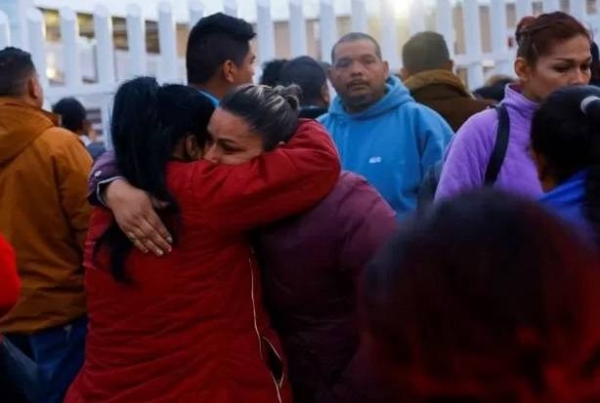 Relatives gathered outside the prison gates after the shootings