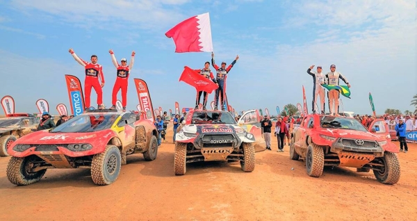 The top three in the 45th Dakar Rally following the finish in Dammam, Saudi Arabia earlier Sunday – (from left) Sebastien Loeb and Fabian Lurquin, winners Nasser Al Attiyah and Mathieu Baumel, and third-placed Lucas Moraes & Timo Gottschalk.