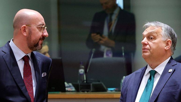 European Council President Charles Michel, left, and Hungary's Prime Minister Viktor Orban at an EU summit in Brussels, Dec. 15, 2022.