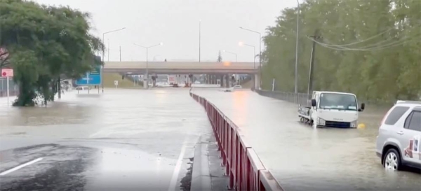 Rain and floods affect homes and roads in Auckland. — courtesy photo