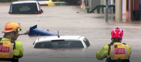 Rain and floods affect homes and roads in Auckland. — courtesy photo