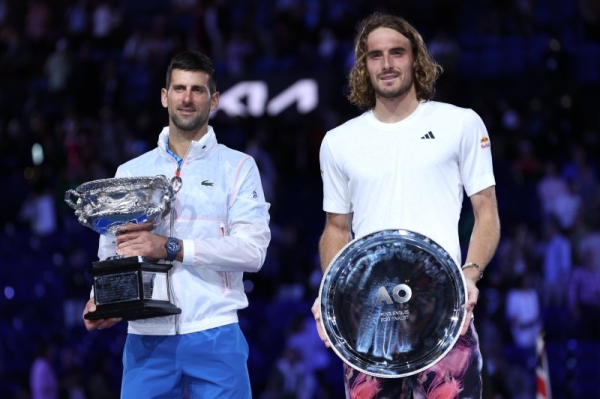  Djokovic swept to a 6-3 7-6(4) 7-6(5) victory at Rod Laver Arena to reclaim the world number one ranking and again deny Tsitsipas a maiden major title. (Twitter @AustralianOpen)