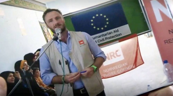 A banner asking to free Belgian aid worker Olivier Vandecasteele, currently detained in Iran, in Brussels, Belgium.
