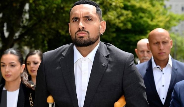 Nick Kyrgios enters an Australian court on Friday
