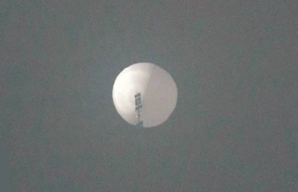 China has urged “cool-headed” handling of a dispute over a giant Chinese balloon heading for the eastern US.