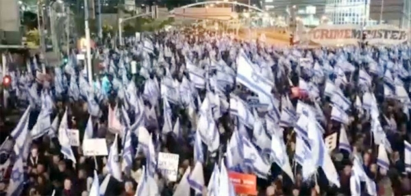 Israelis protest against plans by Prime Minister Benjamin Netanyahu’s new government to overhaul the judicial system, in Tel Aviv, Israel.