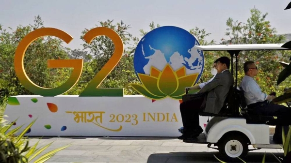 Delegates ride in a buggy at G20 finance officials meeting venue near Bengaluru, India. — courtesy Reuters