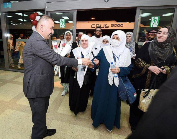 Passengers arriving aboard the Somon Air flight are being received at King Abdulaziz International Airport in Jeddah.