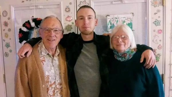 Jerry Jouret (left) with wife Sharon (right) and their grandson Christian (middle)