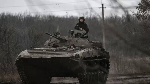 Ukrainian servicemen travel towards Bakhmut on Saturday