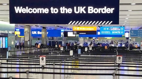 File photo of UK border sign welcomes passengers on arrival at Heathrow airport in west London.