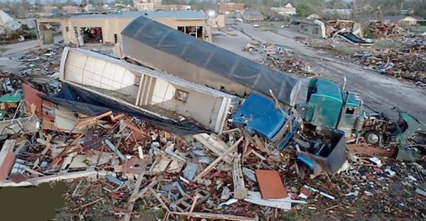 In Rolling Fork, crushed cars, bricks and glass litter the streets — the town has been almost entirely wiped out.