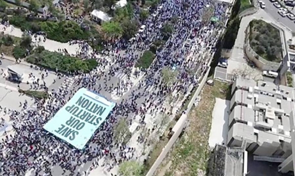 Drone footage shows Israel protesters turning out into the streets against judicial reforms.