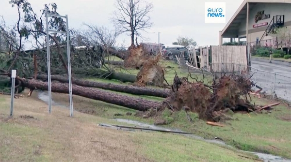 Storm damage is evident in Arkansas and Illinois in the US on Saturday.