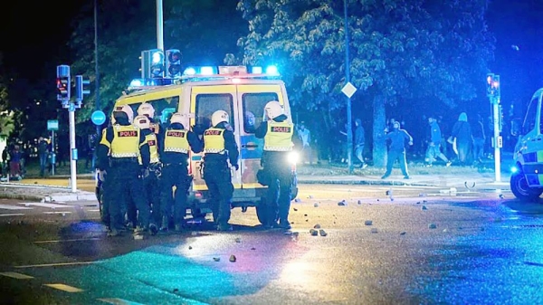 File photo shows far-right activists burning a Qur’an in the southern Swedish city of Malmo, sparking riots and unrest, 28 August 2020. — courtesy AP