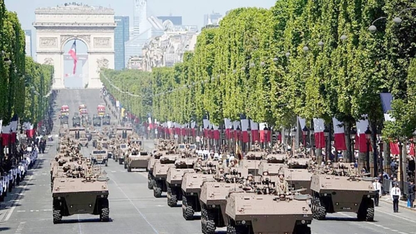 French servicemen drive Griffon multirole armored vehicle during the Bastille Day military parade on the Champs-Élysées avenue in Paris on July 14, 2022. — courtesy AP