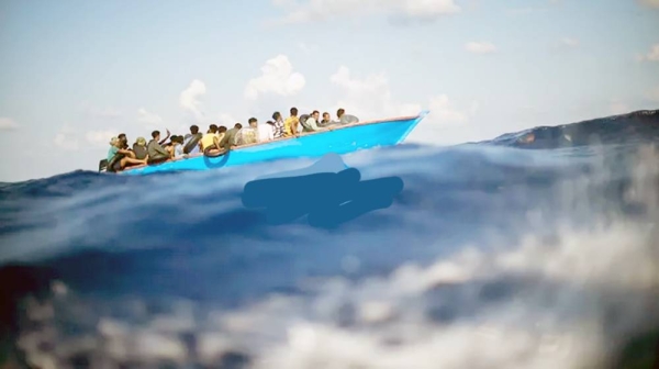 Migrants sail a wooden boat at south of the Italian Lampedusa island at the Mediterranean sea, Aug. 11, 2022.