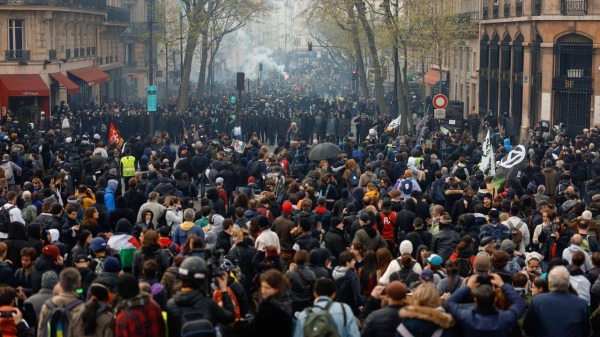 People demonstrate on the streets for the 12th day of nationwide strikes amid protests against pension reform on April 13, 2023 in Paris, France