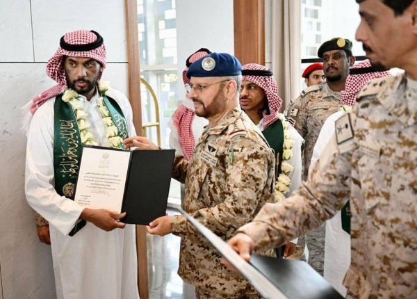 Deputy Chief of the General Staff and Commander of the Joint Forces Lt. Gen. Mutlaq Al-Azima welcomes the prisoners at King Khalid International Airport in Riyadh.