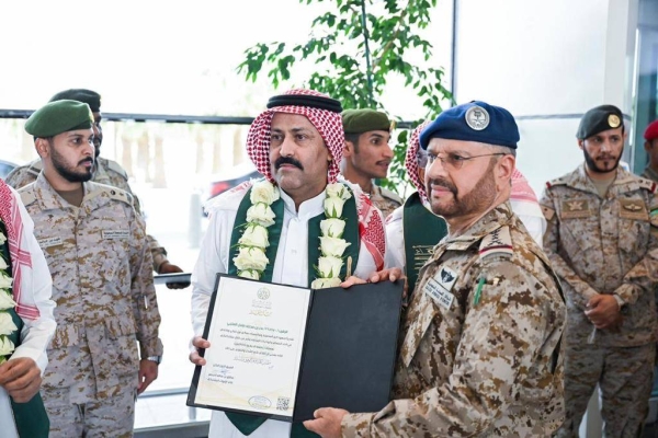Deputy Chief of the General Staff and Commander of the Joint Forces Lt. Gen. Mutlaq Al-Azima welcomes the prisoners at King Khalid International Airport in Riyadh.