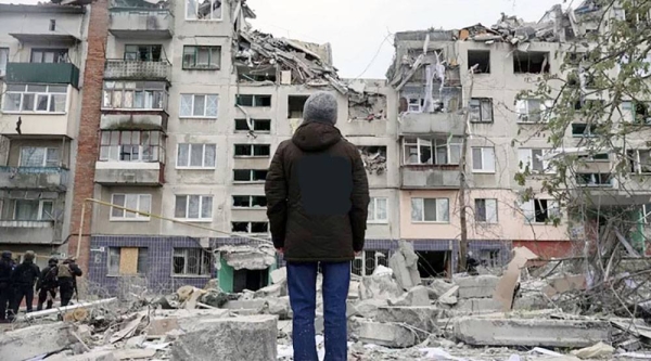 A local resident looks at his home, damaged by a Russian rocket attack in Sloviansk, Donetsk region, Ukraine, Friday. — courtesy AP