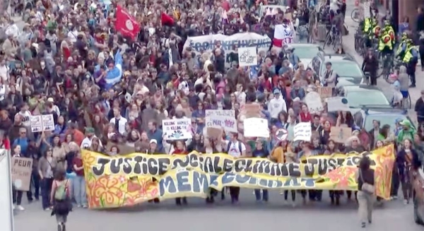 Thousands of people took to the streets of Montreal to call on the Canadian government to do more to fight climate change.