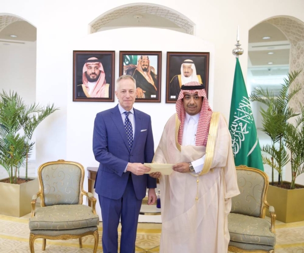 Deputy Minister for Protocol Affairs Abdulmajeed Al-Smari receives a copy of Ratney's credentials in Riyadh.