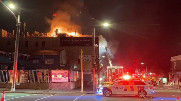 The hostel building on fire