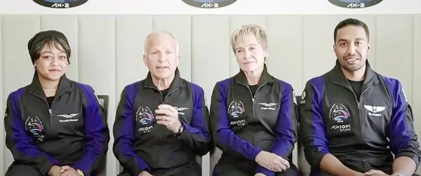 Saudi astronauts Rayyanah Barnawi, left, and Ali Al-Qarni, right, with US astronauts Peggy Whitson and John Shoffner, speak at the Tuesday’s Axiom Space press conference.