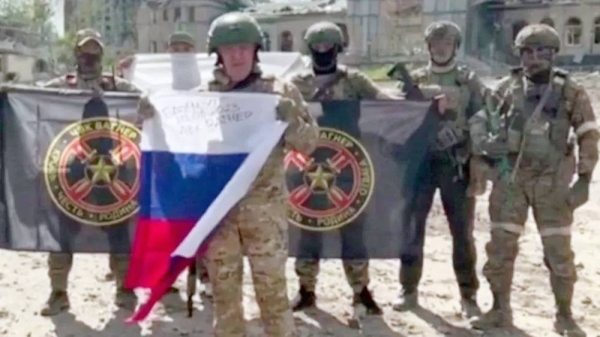 Yevgeny Prigozhin claimed to control Bakhmut in a video flanked by Wagner fighters. — courtesy Telegram