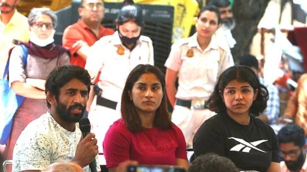 The protesters include Olympic medallists such as Bajrang Punia (left) and Sakshi Malik (right)