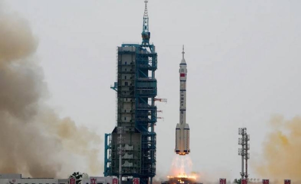 A Long March 2F rocket carrying a crew of Chinese astronauts on the Shenzhou-16 spaceship lifts off at the Jiuquan Satellite Launch Center in northwestern China on Tuesday. 