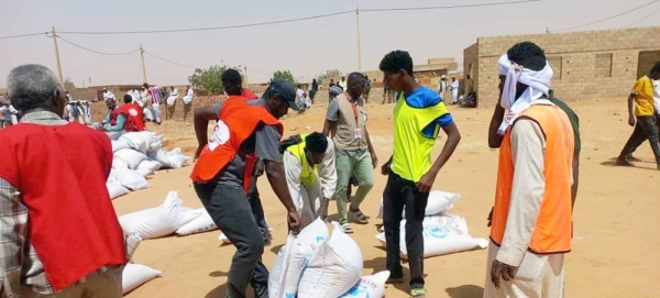 Food is distributed in Omdurman, close to the Sudanese capital, Khartoum. — courtesy Sudanese Red Crescent Society