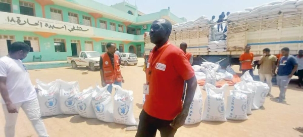 Food is distributed in Omdurman, close to the Sudanese capital, Khartoum. — courtesy Sudanese Red Crescent Society