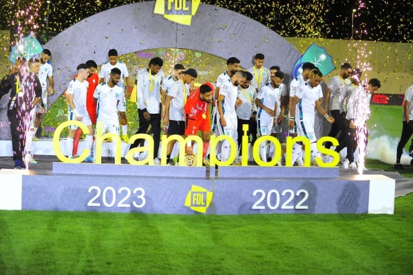 Al-Ahli squad members leaving Al-Hazm Club stadium in Al-Rass without celebrating their return to the Saudi Professional League.