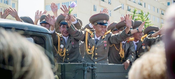Military officers celebrate at a parade in the North Korean capital, Pyongyang. (file). — courtesy Unsplash/Micha Brändli