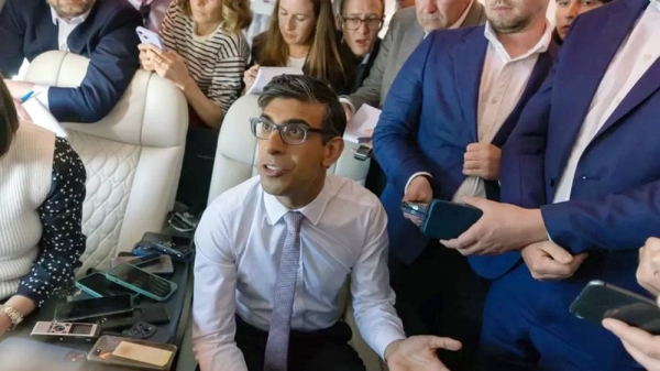 British Premier Rishi Sunak speaking to reporters on the plane to Washington DC. — courtesy Rishi Sunak