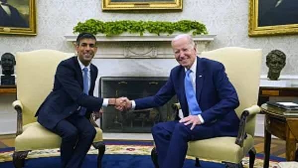 Britain's Prime Minister Rishi Sunak, left, and US President Joe Biden, right, shake hands during their bilateral meeting in the White House, Washington, Thursday.
