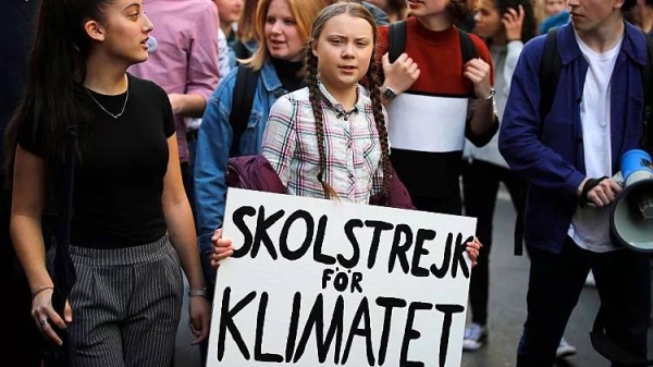 Greta Thunberg leads a student march through Paris, 25 September 2019.