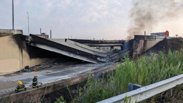 A side view shows the partial collapse of Interstate 95 after a fire underneath a Philadelphia overpass. — courtesy City of Philadelphia Office of Emergency Management/Reuters