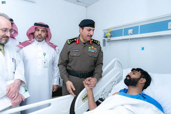Director of Public Security Lt. Gen. Muhammad Al-Bassami visits family members of martyred security official, and injured security men in Rafha on Tuesday.