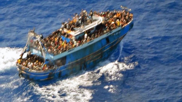 The overcrowded vessel was pictured a number of times before tragedy struck. — courtesy Greek Coast Guard