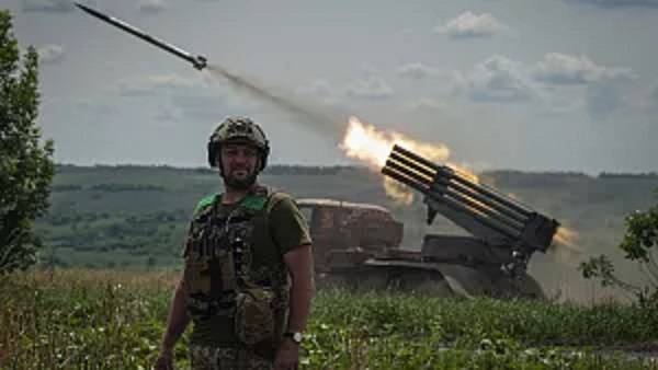A Ukrainian MSLR BM-21 Grad fires towards Russian positions, near Bakhmut at the frontline in Donetsk region, Ukraine, Wednesday, June 21, 2023.