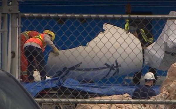 Pieces from the sub, which imploded on a deep dive to the Titanic, were unloaded in St John's, Canada, on Wednesday.