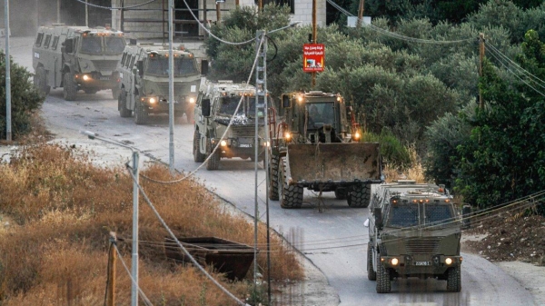 Israeli military vehicles starting to withdraw from the occupied West Bank city of Jenin.