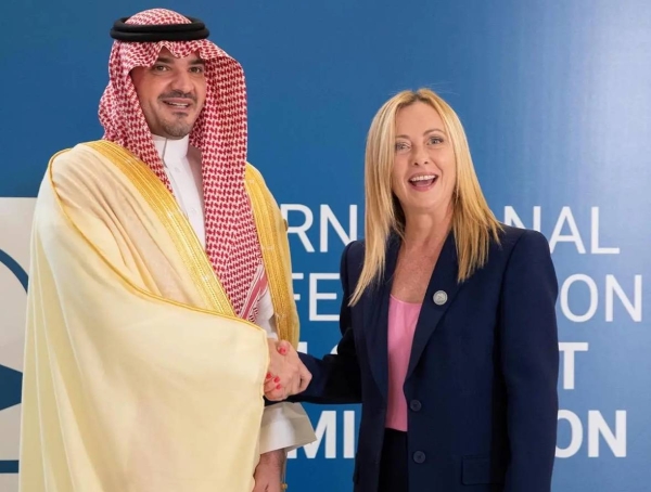 Saudi Minister of Interior Prince Abdulaziz bin Saud shake hands with Italian Prime Minister Giorgia Meloni in Rome.