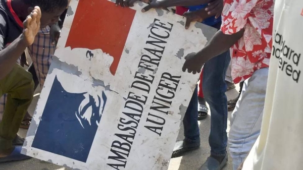 Protesters outside the French embassy on Sunday chanted 'Long live Russia' and 'Down with France'